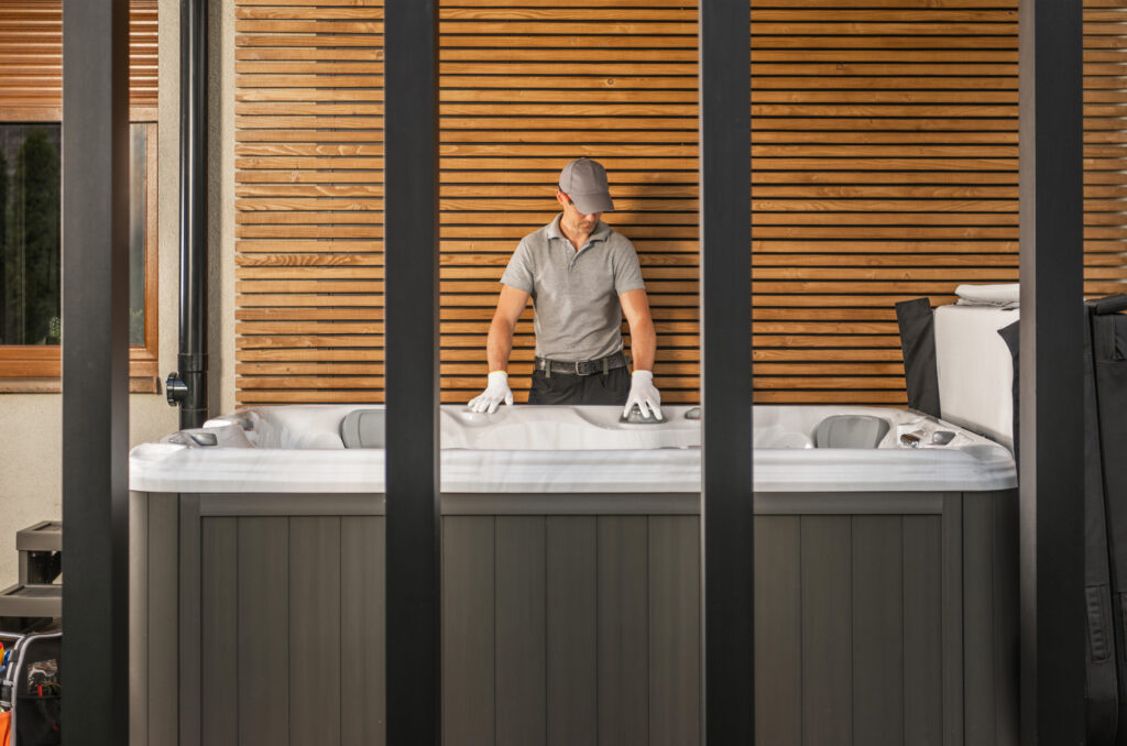 Professional Hot Tub Technician Worker Performing Outdoor SPA Service